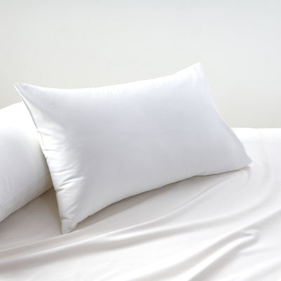 White standard pillowcases provide a luxurious blend for a soothing and hypoallergenic sleep experience.