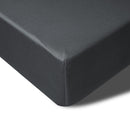 Lightweight coverlet draped across a bed in a cosy bedroom setting