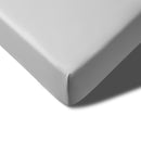 Accessorize grey bamboo cotton coverlet styled in a cosy, light-filled bedroom with layered textures