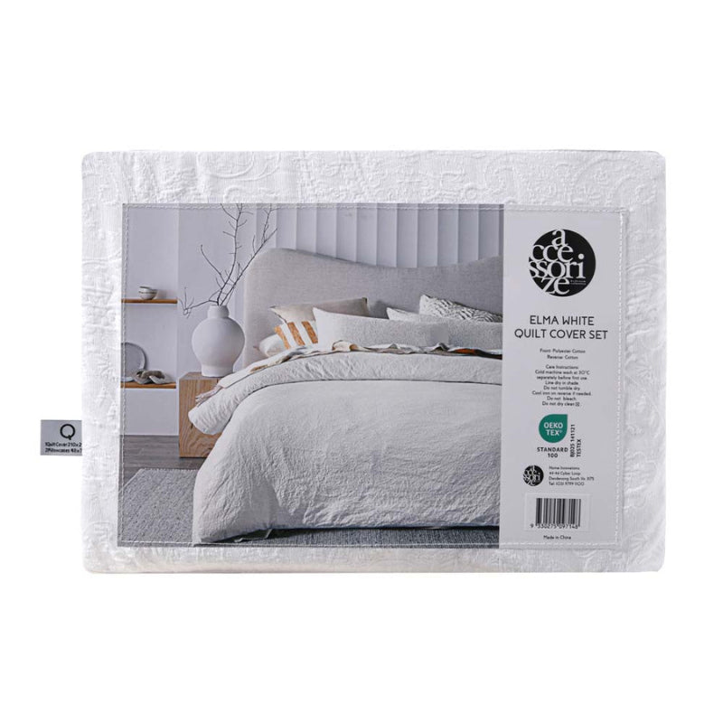 alt="Back packaging details of a white quilt cover set featuring a stunning timeless jacquard design."