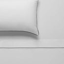 alt="Close up view of deluxe cotton white and black sheet set"