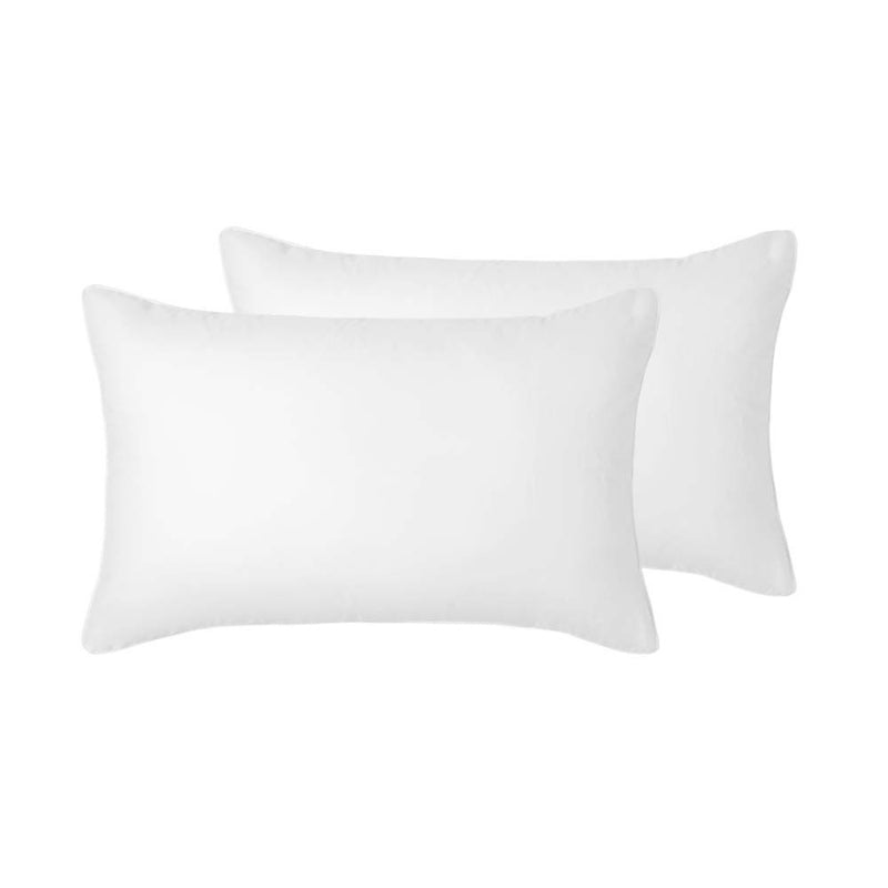 alt="Close up look of white standard pillowcase with a beautiful piped edge"