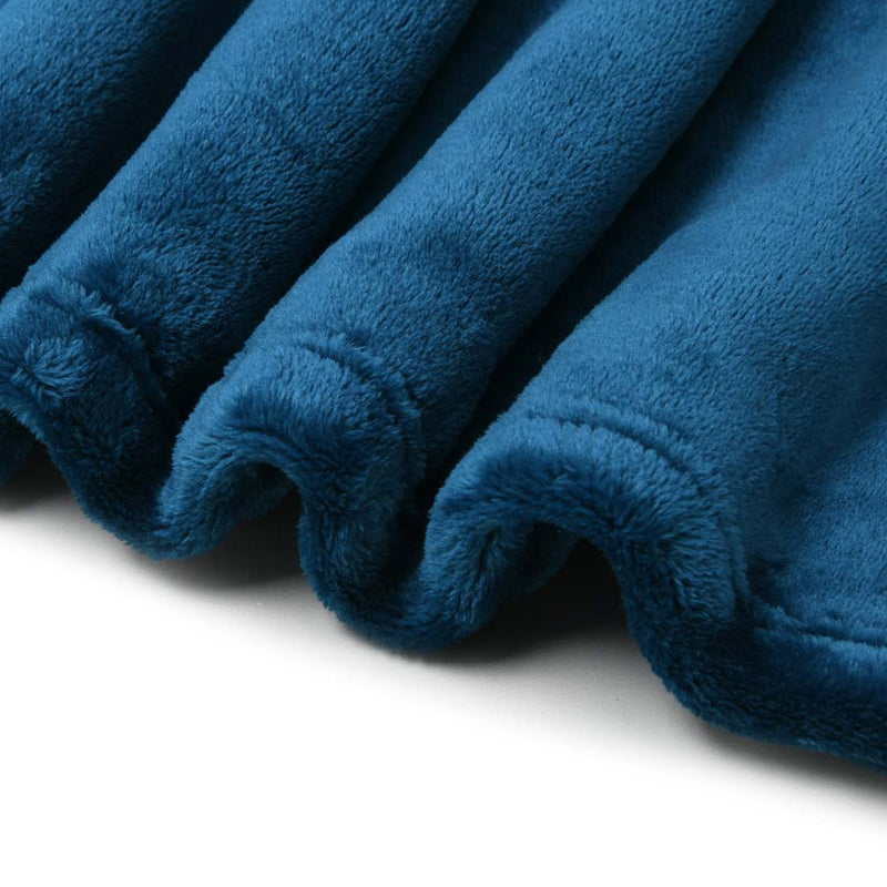 alt="Hem details of the super soft ink blue blanket"