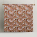 Detailed shot of the Rainbow Garden Autumn Quilt Cover Set, featuring an orange and brown floral pattern.