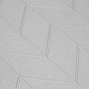 Close up details of a light grey bath stone with its super porous surface, keeps your floor clean and dry, minimizing bacteria growth.