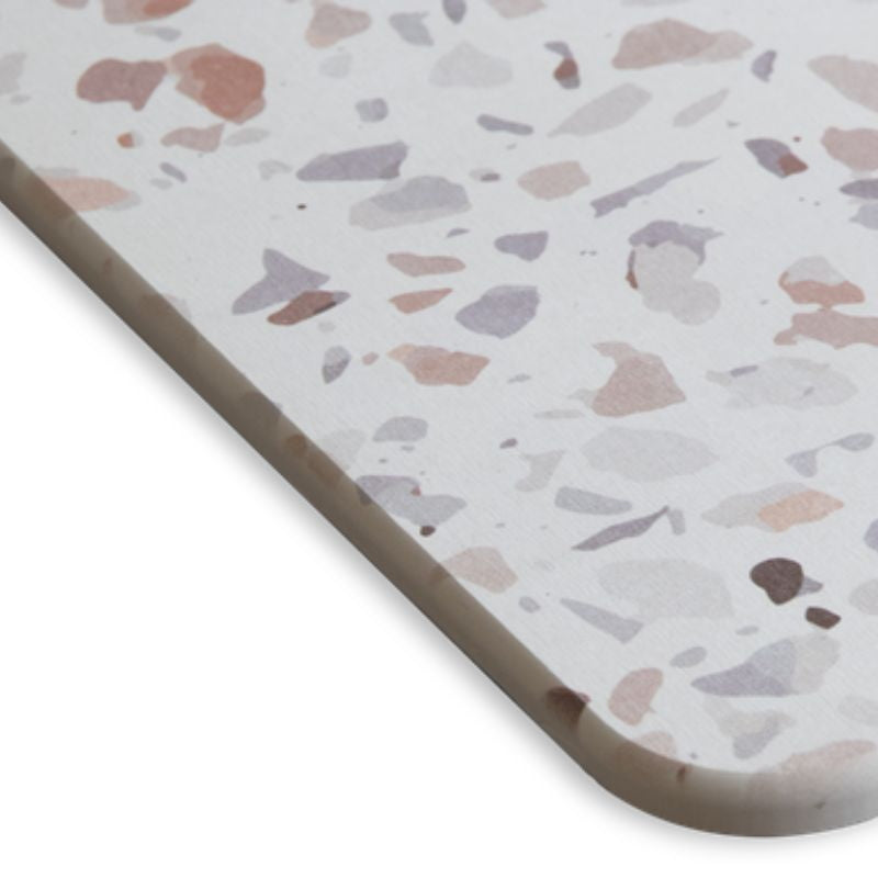 Detailed shot of a multicoloured bath stone with its super porous surface, keeps your floor clean and dry, minimizing bacteria growth.
