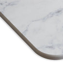 Detailed shot of a white marble bath stone with its super porous surface, keeps your floor clean and dry, minimizing bacteria growth.