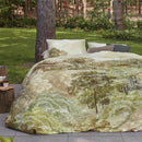 alt="A quilt cover set designed with an idyllic hand-painted landscape of wooded hills with trees"