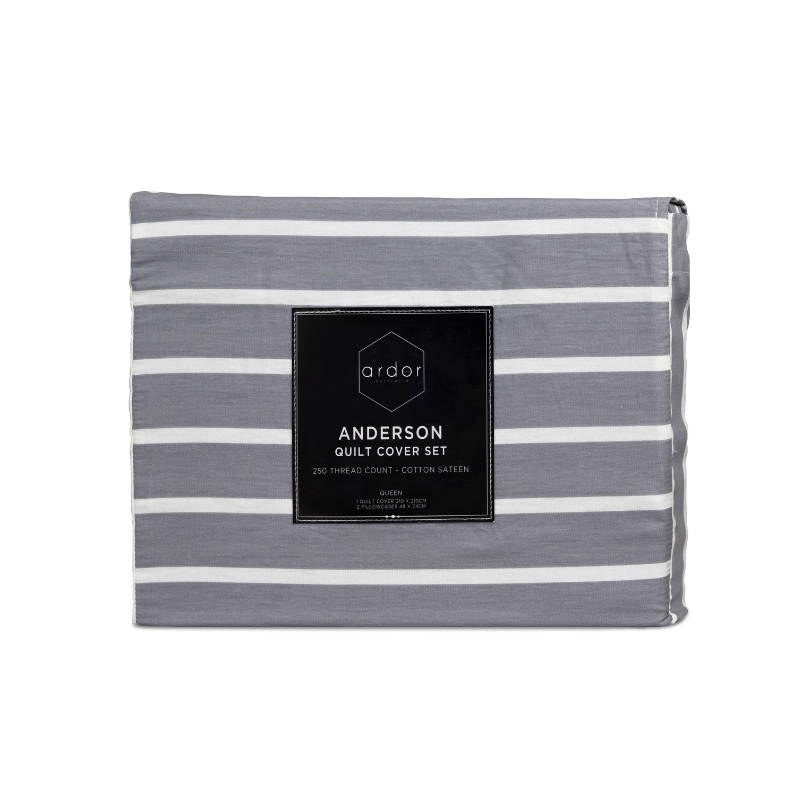 Modern grey and white striped bedding set displayed in packaging, highlighting its comfort and reversible design for a stylish bedroom.