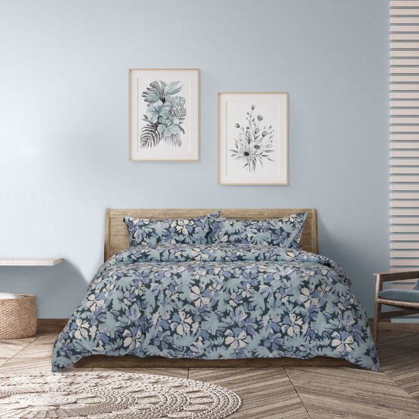 A sophisticated teal quilt cover set floral fabric, enhancing bedroom elegance with its unique layered design and soothing tones.