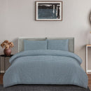 Stylish bedroom with a teal checkered quilt cover set, blending classic charm and modern comfort for a relaxing atmosphere.