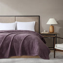 Ardor Boudoir Teddy Mauve Blanket draped across a bed with soft rippling texture