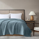 Ardor Boudoir Teddy Sea Mist Blanket draped across a bed with soft rippling texture
