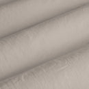 A detailed view of a white sheet, showcasing the luxurious comfort and sophisticated design 