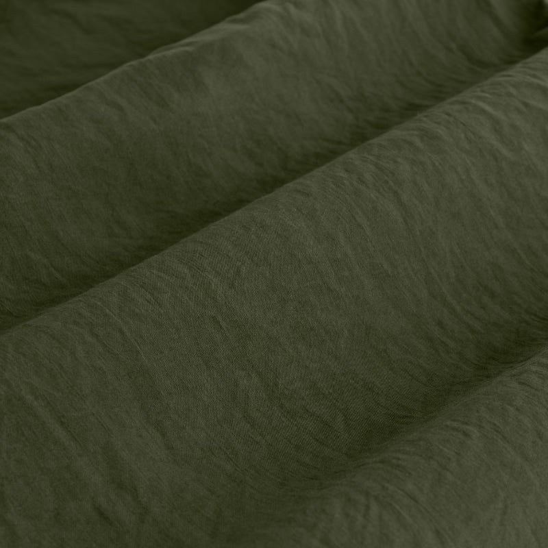 A close-up of vintage washed khaki quilt cover set , exuding luxury and comfort, perfect for a serene bedroom retreat.