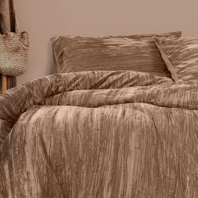 Experience the luxurious quilt cover set exuding opulence and elegance in soft champagne tones.
