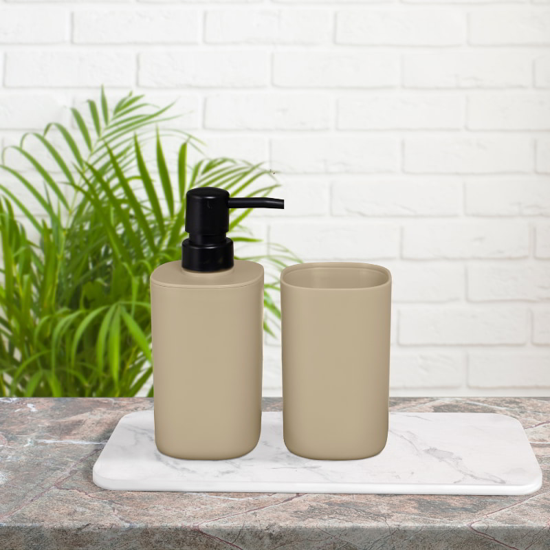 Elegant bathroom accessories including a soap dispenser and soap, alongside the functional marble stone sink mat for a tidy sink area.