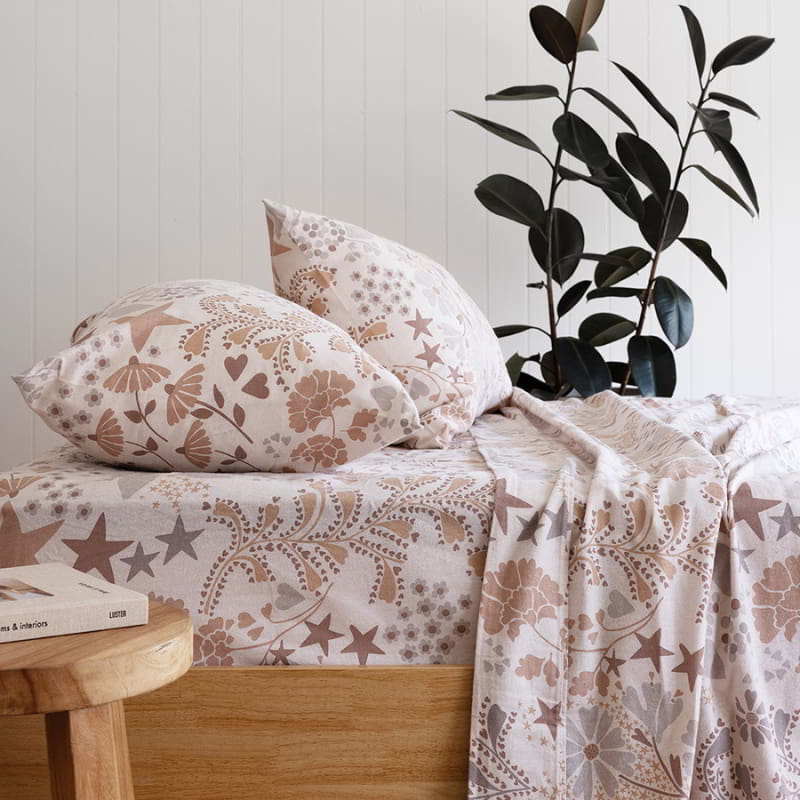 A soft flannelette sheet set featuring a decorative floral pattern in beautiful soft muted tones.