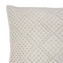 alt="Close-up view of an ivory macrame diamond pattern square cushion"