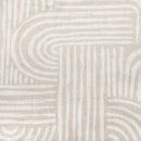 Detailed view of brushed cotton flannelette fabric showing white and taupe geometric pattern