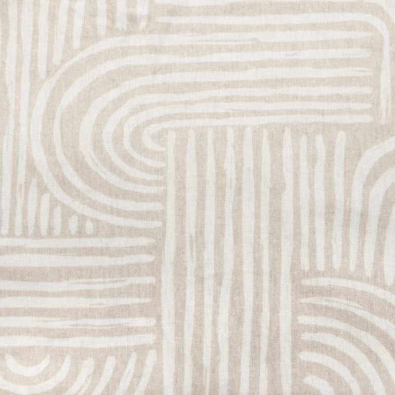 Detailed view of brushed cotton flannelette fabric showing white and taupe geometric pattern