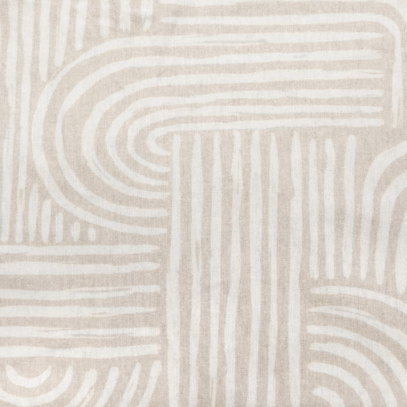Close-up of the soft brushed cotton fabric in white and taupe pattern