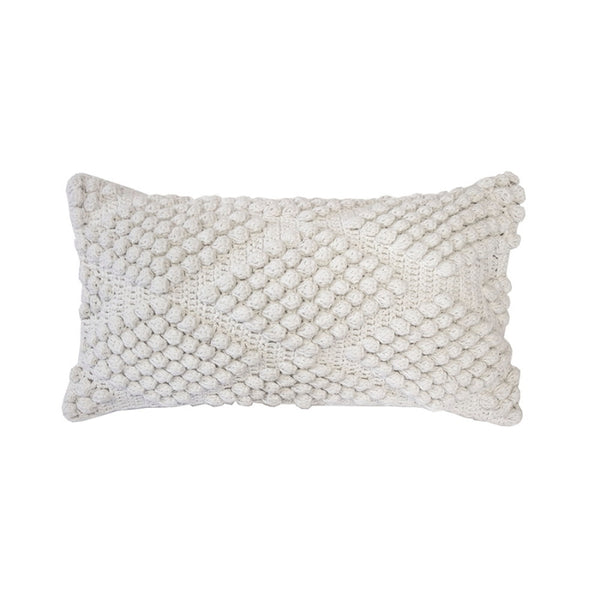 alt="An ivory cotton yarn woven diamond pattern rectangular cushion"
