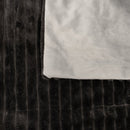 Detail of charcoal velour front and soft grey fleece reverse fabric

