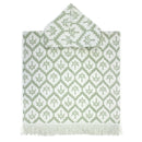alt="Kids sage green poncho featuring a stylish palm tree pattern with knotted tassels along the ends"