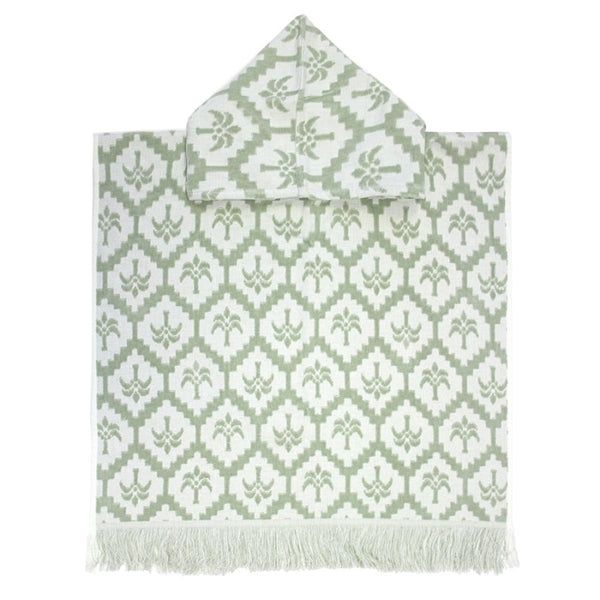 alt="Kids sage green poncho featuring a stylish palm tree pattern with knotted tassels along the ends"