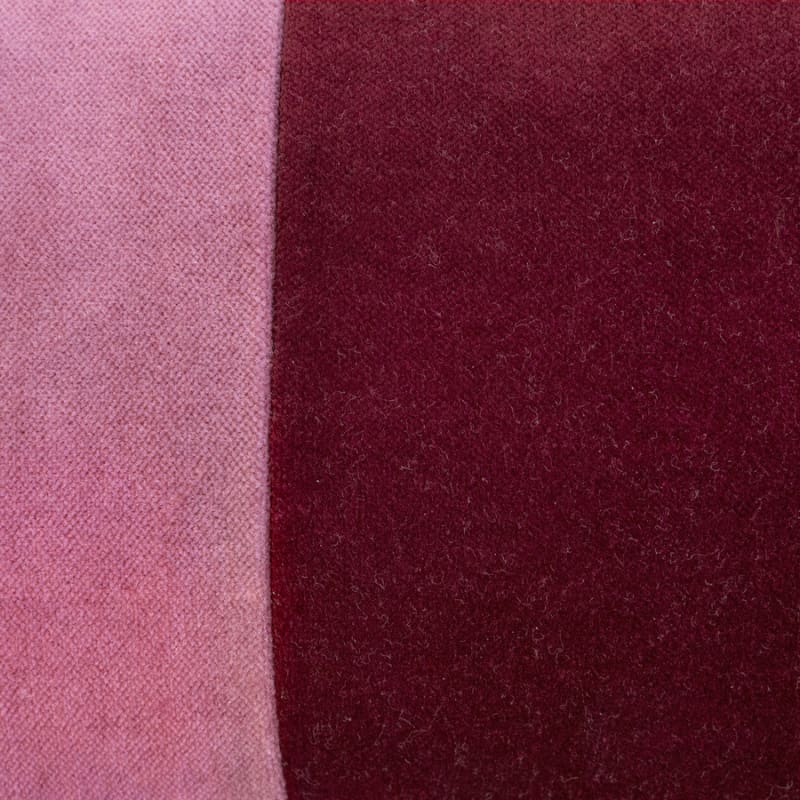 Close-up of soft cotton velvet fabric and rich purple and pink colour detail