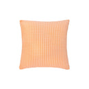 A stylish orange and white checkered pillow, enhancing decor with its rich waffle fabric and soft, durable cotton yarn.