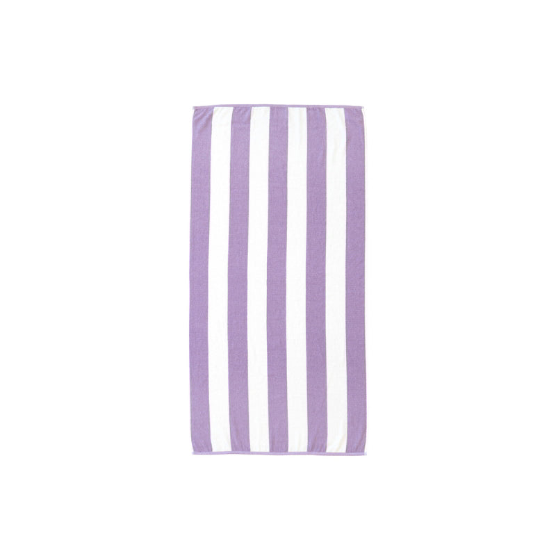 A purple and white striped beach towel, made from reused cotton, perfect for eco-friendly beach or pool days.