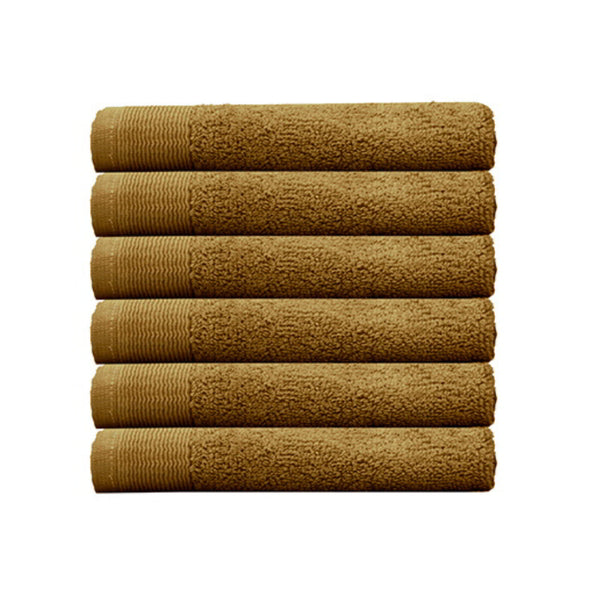 alt="Six beautiful, soft tobacco yellow cotton face washers"