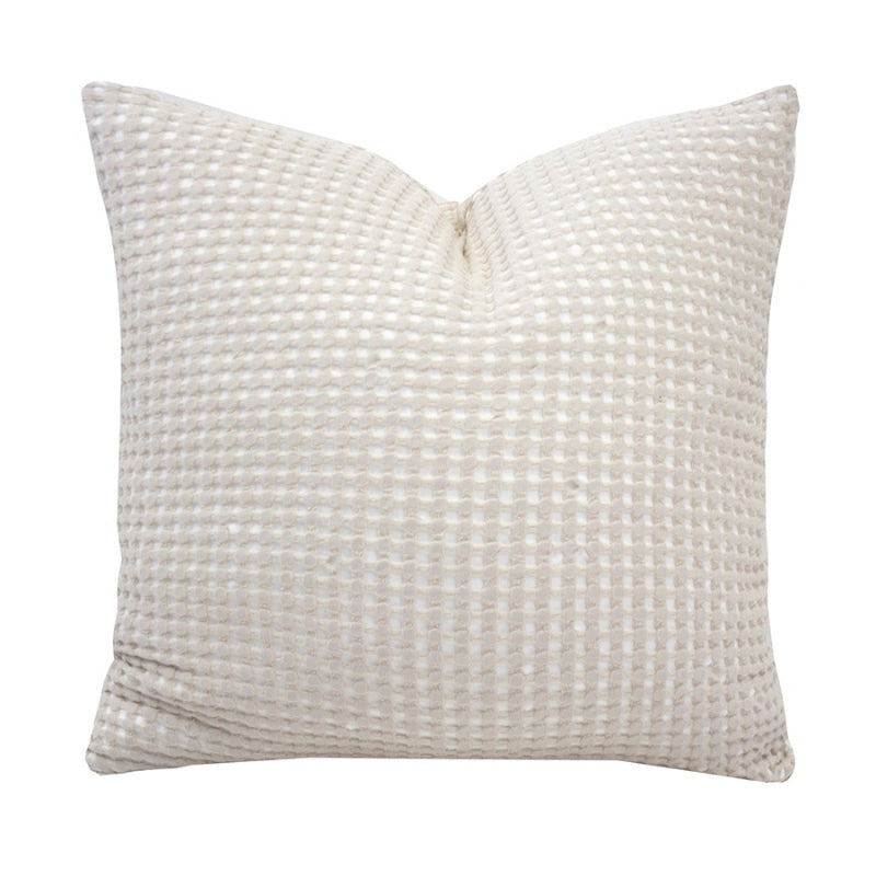 alt="Square cushion in two-tone white and ivory waffle fabric"
