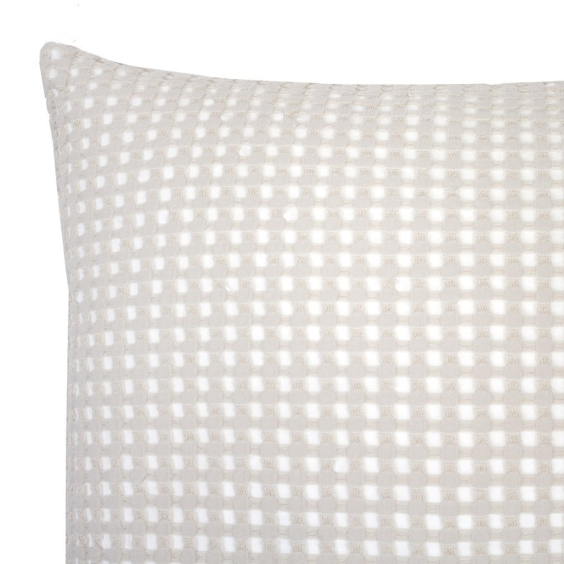 alt="Close-up view of a square cushion in two-tone white and ivory waffle fabric"
