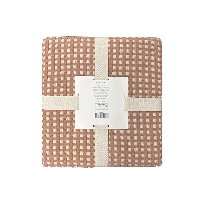 alt="Back view of a two-toned brown throw with a beautiful waffle texture"