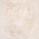 Close-up of faux fur finish on the Frida Snow Throw in natural light

