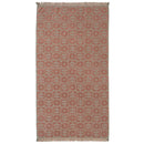 A Hilo Bloom Toffee beach towel featuring floral designs, perfect for adding elegance to beach or pool outings.