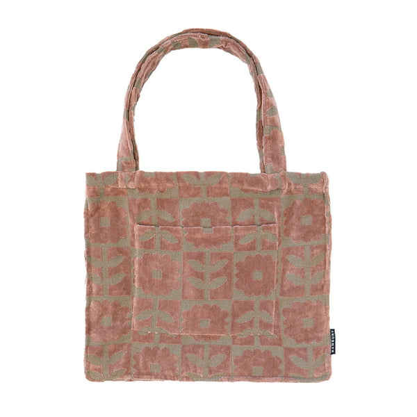 Chic brown floral tote bag, perfect for outings and errands, offering versatility and a sophisticated texture for daily use.