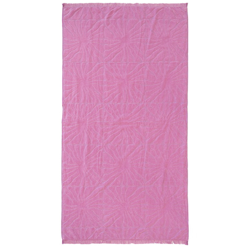 A vibrant pink beach towel featuring a floral pattern, perfect for beach days with its lightweight and quick-drying design.