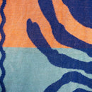 Close-up look of the vibrant blue and orange beach towel featuring a stylish lobster design, perfect for poolside or beach days.