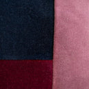 Close-up of the patchwork velvet design in plum, pink and navy


