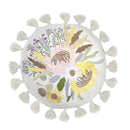 alt=A white cushion featuring a bouquet of embroidered flowers in fun spring colours surrounded with large cotton tassels on edge"