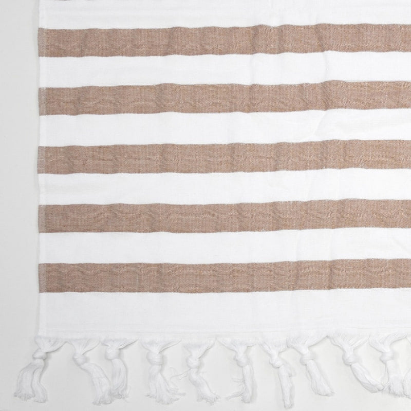 alt="Close-up view of a classic two-tone white and brown stripe pattern with a playful knotted tassels along both ends"