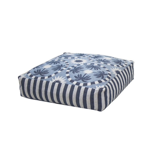 alt="A light blue and dark blue designed with palm tree pattern floor cushion"