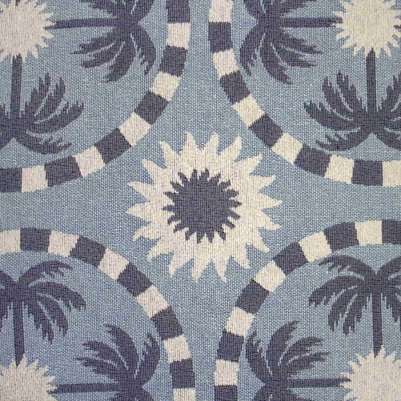 alt="Close-up view of a light blue and dark blue designed with palm tree pattern tote bag"