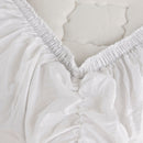 Elasticated corner of the Tru Fit Sheet showing secure grip on the mattress