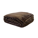 A stack of brown blanket is soft and silky to touch, perfect for warmth on the bed or cosying up on the couch.