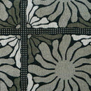 Detailed view of the Zinnia Moss Throw two-toned waffle fabric, showcasing elegance and nature-inspired design in a stylish home setting.